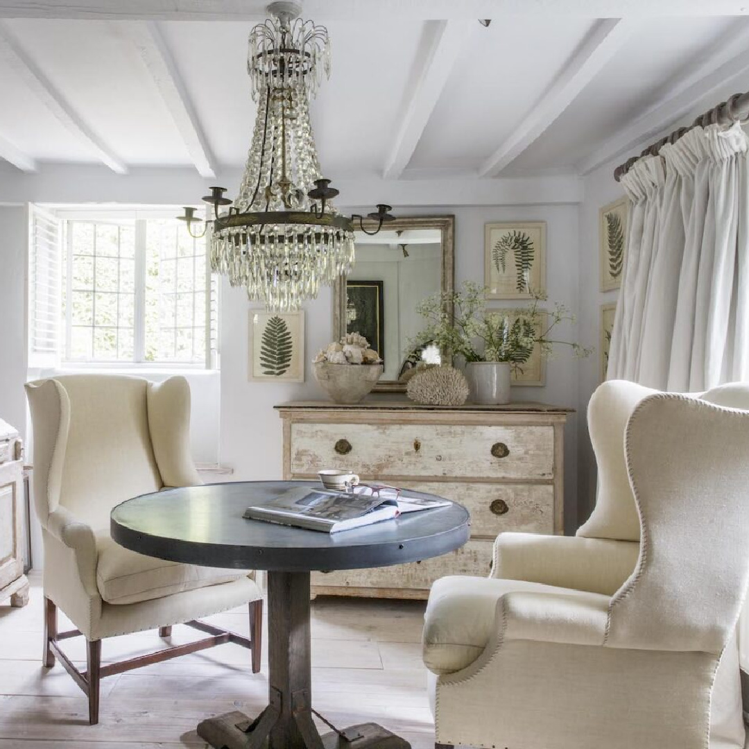 Beautiful English country cottage dining room with empire style crystal chandelier, antiques, and tone on tone - Anton & K.