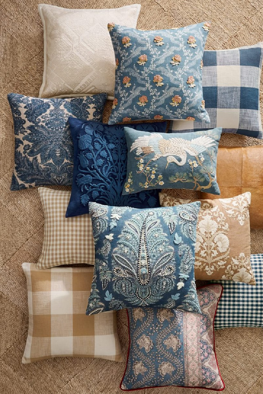 Assortment of blue and camel pillows from Pottery Barn's Spring Look Book for 2026.