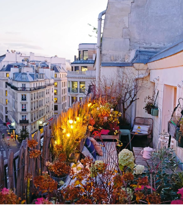 Lovely Paris balcony and apartment buildings in LA MAISON by Zoe de Las Cases.