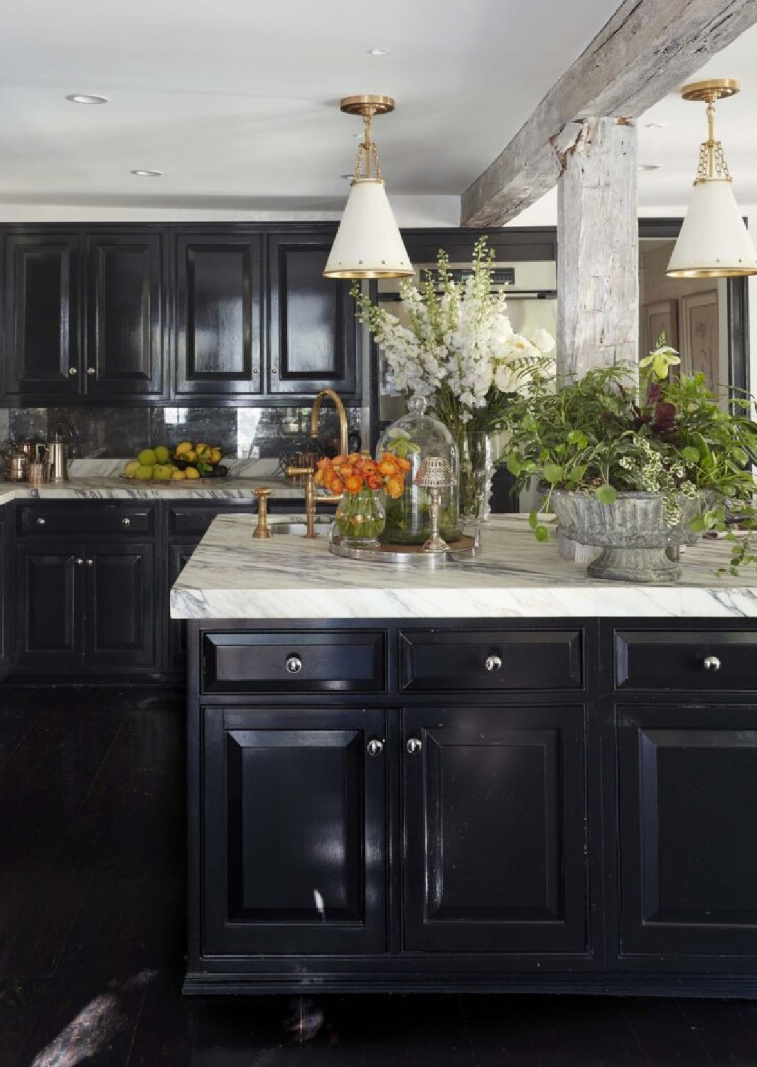 Gorgeous black kitchen in New York home tour with design by Brittany Bromley.