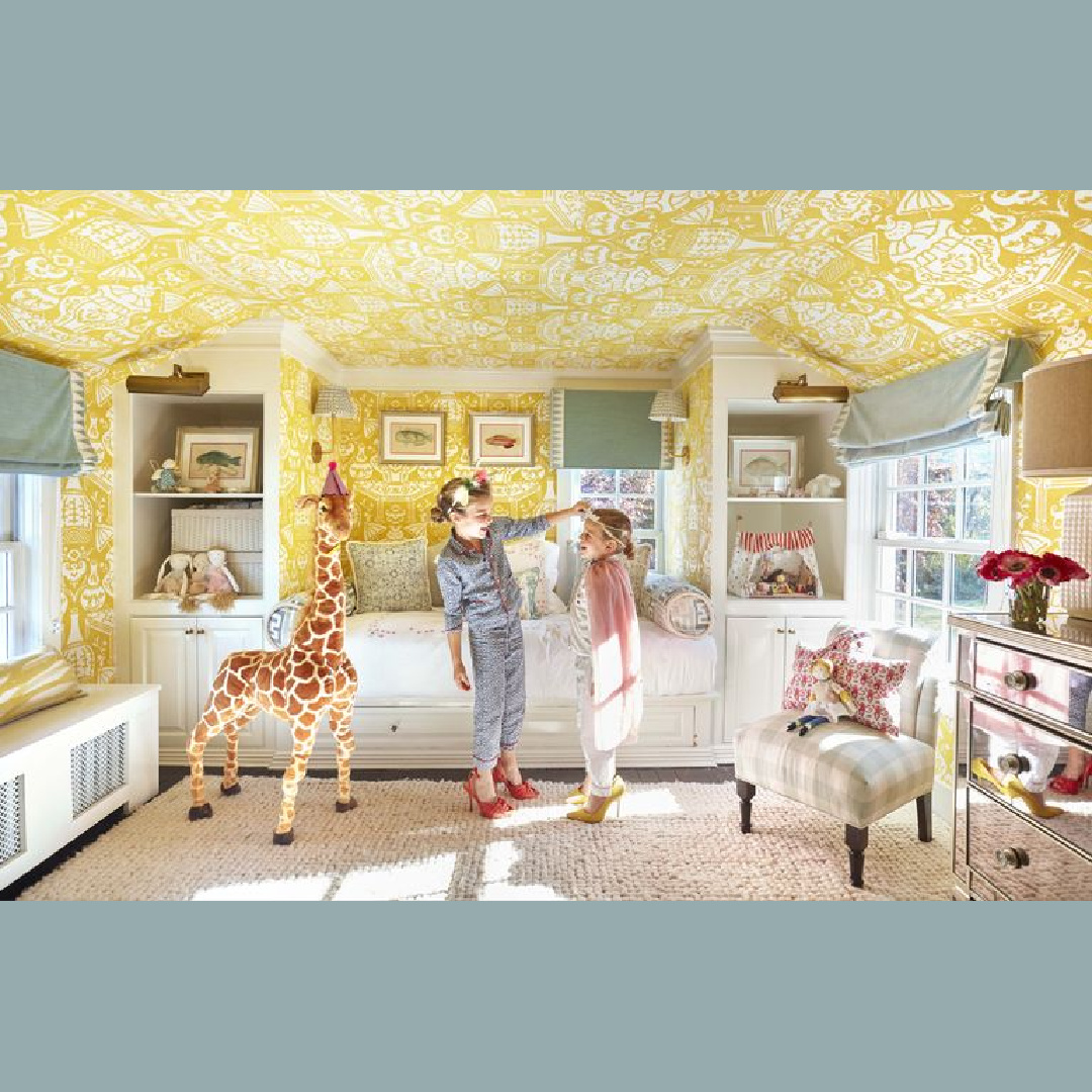 Darling girls room with fanciful Chinoiserie yellow wallpaper and built-in daybed - design by Brittany Bromley.