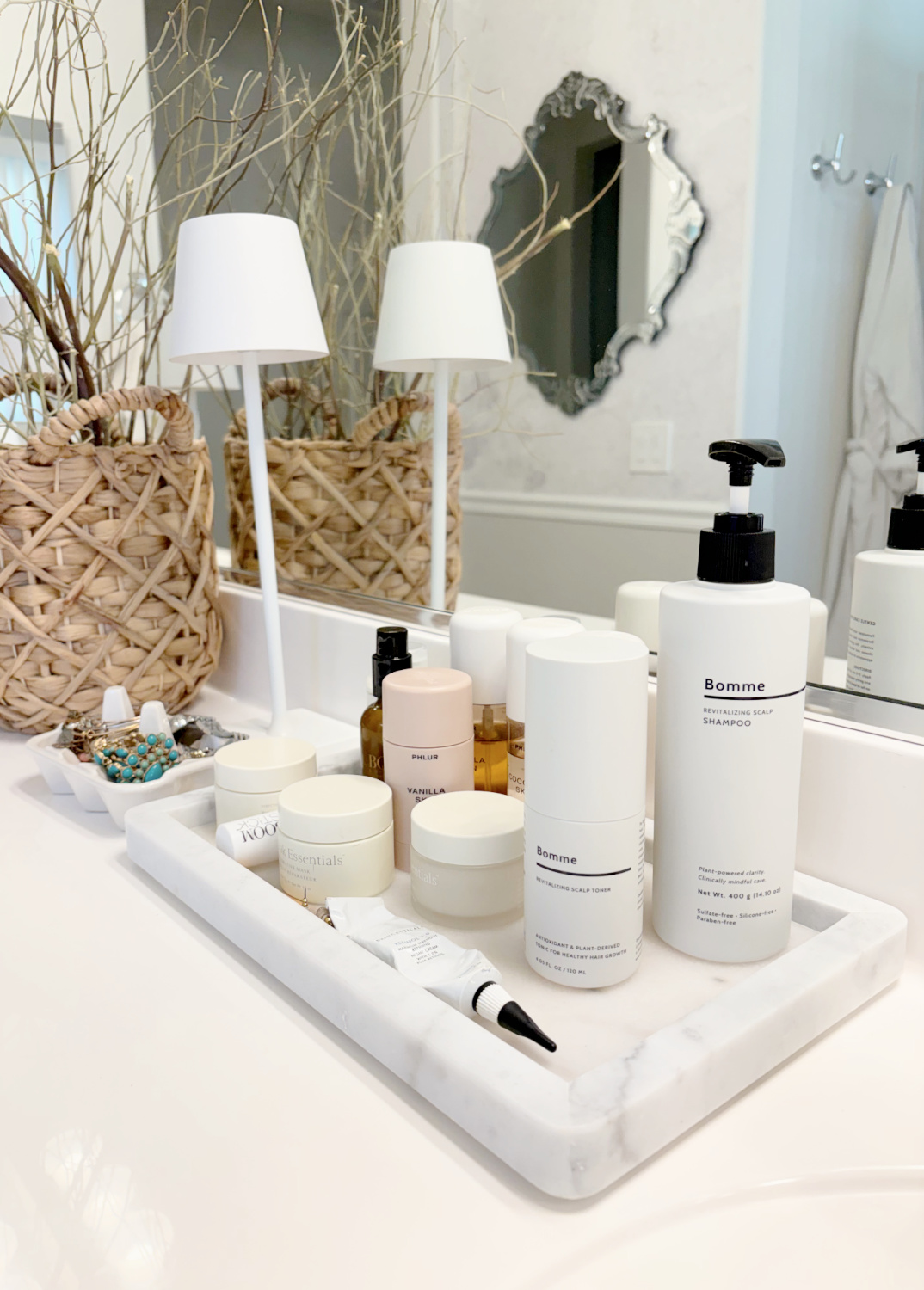 Hello Lovely's bath vanity with Bomme Revitalizing Scalp Shampoo and Toner. #hairhealth #hairgrowth