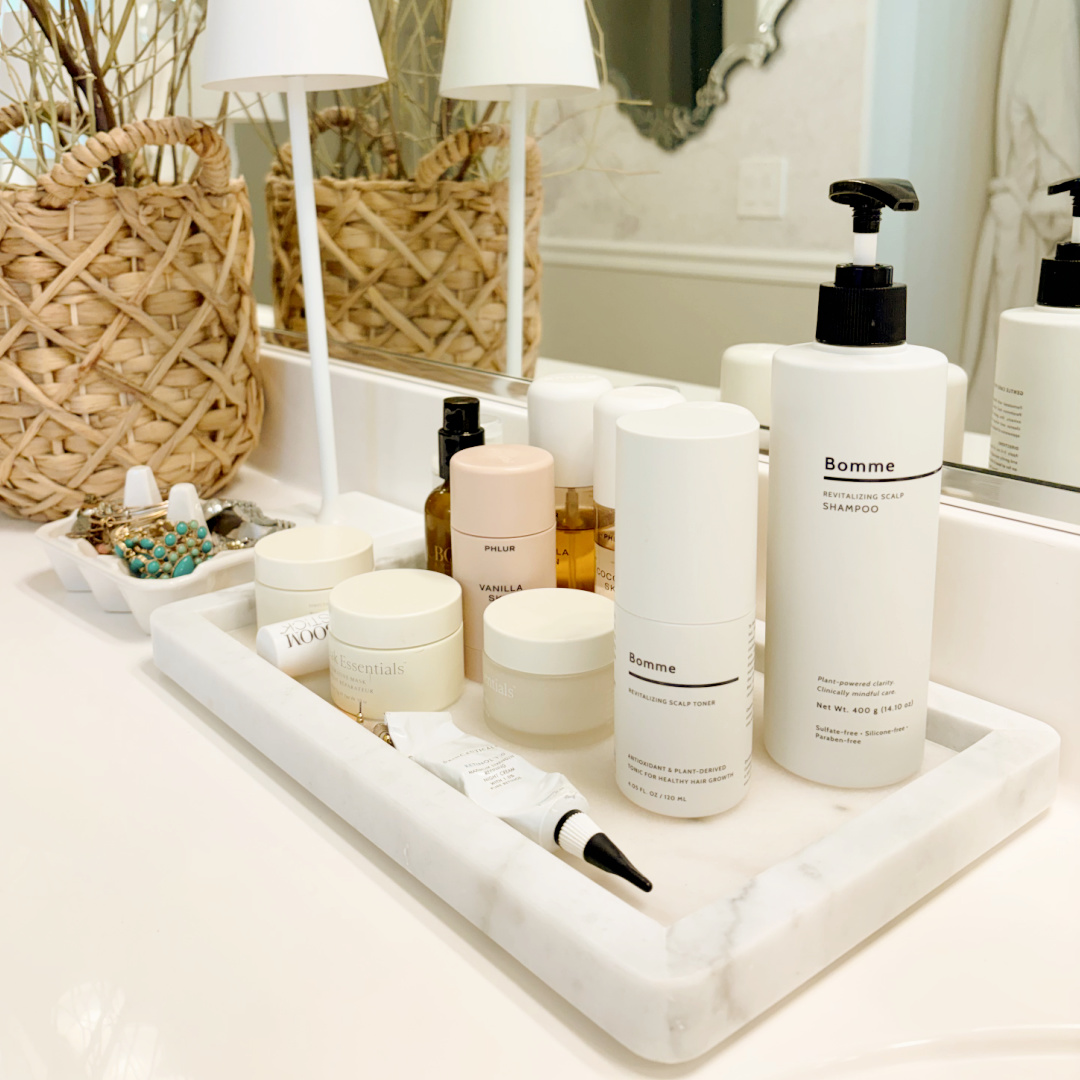 Hello Lovely's bath vanity with Bomme Revitalizing Scalp Shampoo and Toner. #hairhealth #hairgrowth