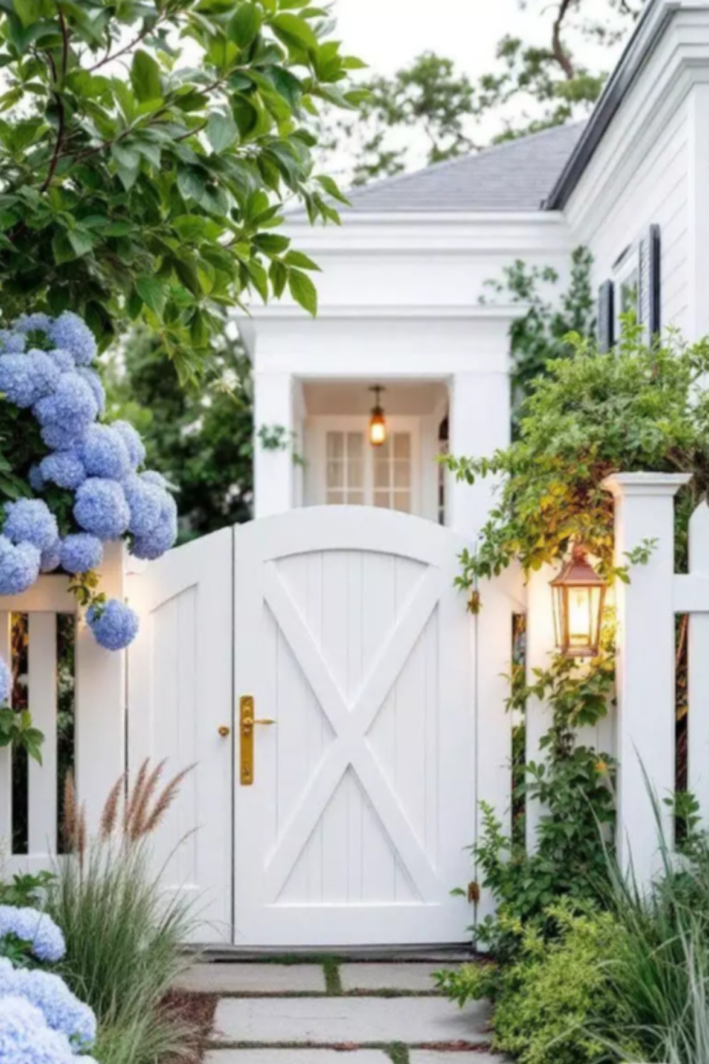 Beautiful arched garden gate at coastal cottage entrance with blue hydrangea - via Pinterest. #coastalpretty