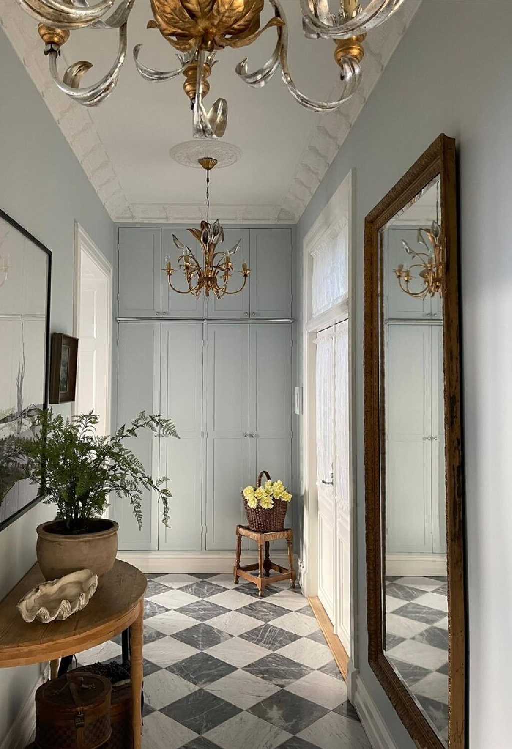 Farrow & Ball Borrowed Light in a beautiful hall with checkered floor - @seashellsandchandeliers.