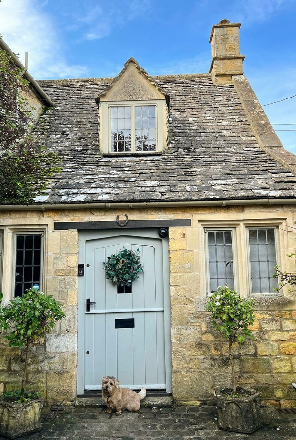 Cotswold cottage with front door painted Farrow & Ball Borrowed Light - @thesmallhouse__cotswolds.