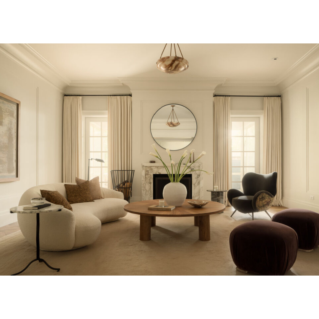 Modern French living room (Clements Design) in a Hidden Hills, CA storybook home with neutral decor and famous occupants including Jennifer Lawrence, Jessica Simpson, and Ellen DeGeneres.