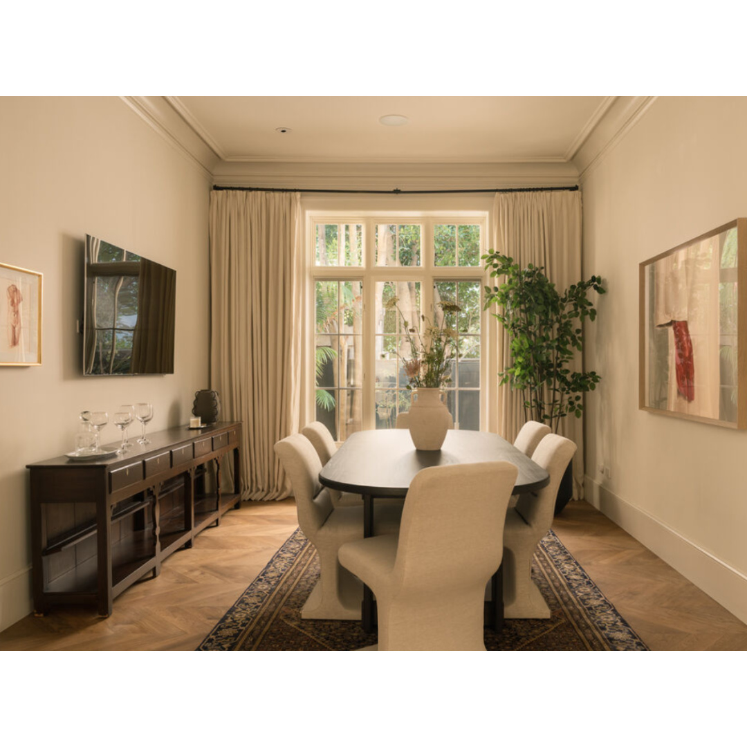 Modern French dining room (Clements Design) in a Hidden Hills, CA storybook home with neutral decor and famous occupants including Jennifer Lawrence, Jessica Simpson, and Ellen DeGeneres - Realtor.com