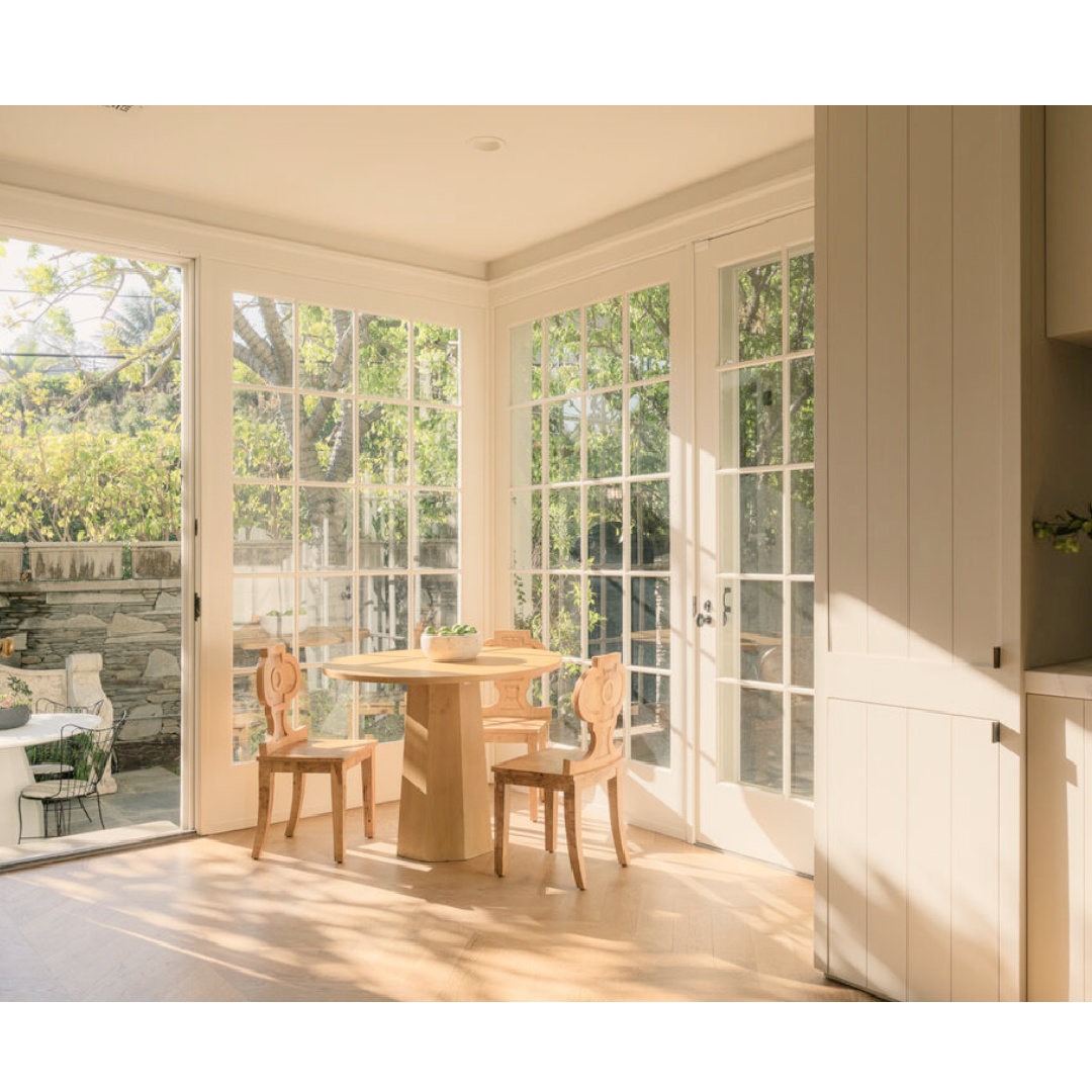 Minimal European inspired breakfast nook (Clements Design) in a Hidden Hills, CA storybook home with neutral decor and famous occupants including Jennifer Lawrence, Jessica Simpson, and Ellen DeGeneres - Realtor.com
