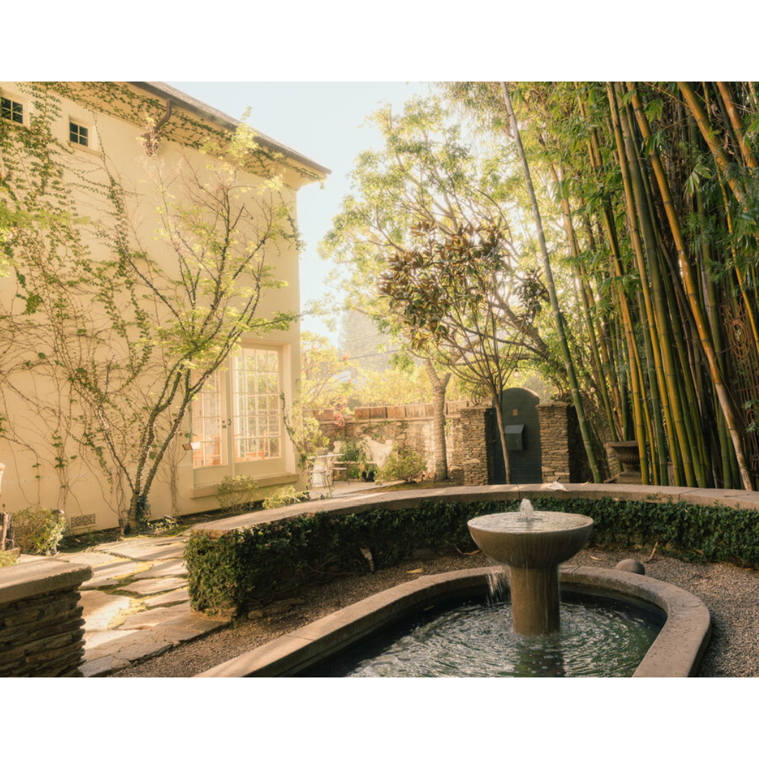 Beautiful gardens. Modern French interiors (Clements Design) in a Hidden Hills, CA storybook home with neutral decor and famous owners including Jennifer Lawrence, Jessica Simpson, and Ellen DeGeneres - Realtor.com