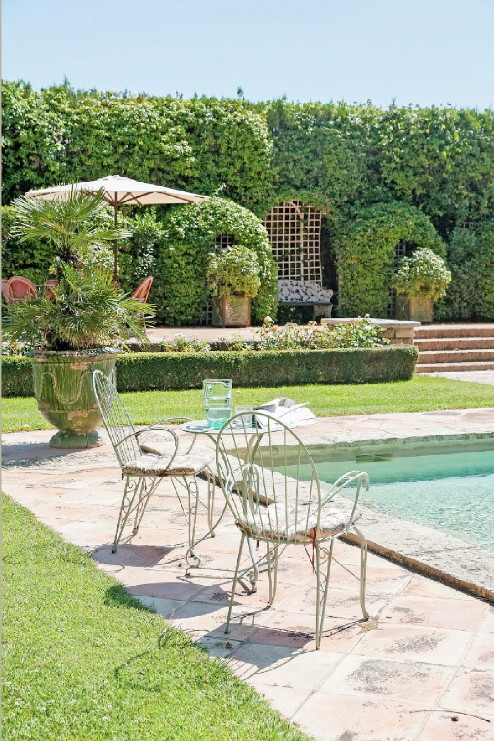 Traditional French country gardens, courtyard and pool at South of France property Chateau Mireille - Your Haven In.