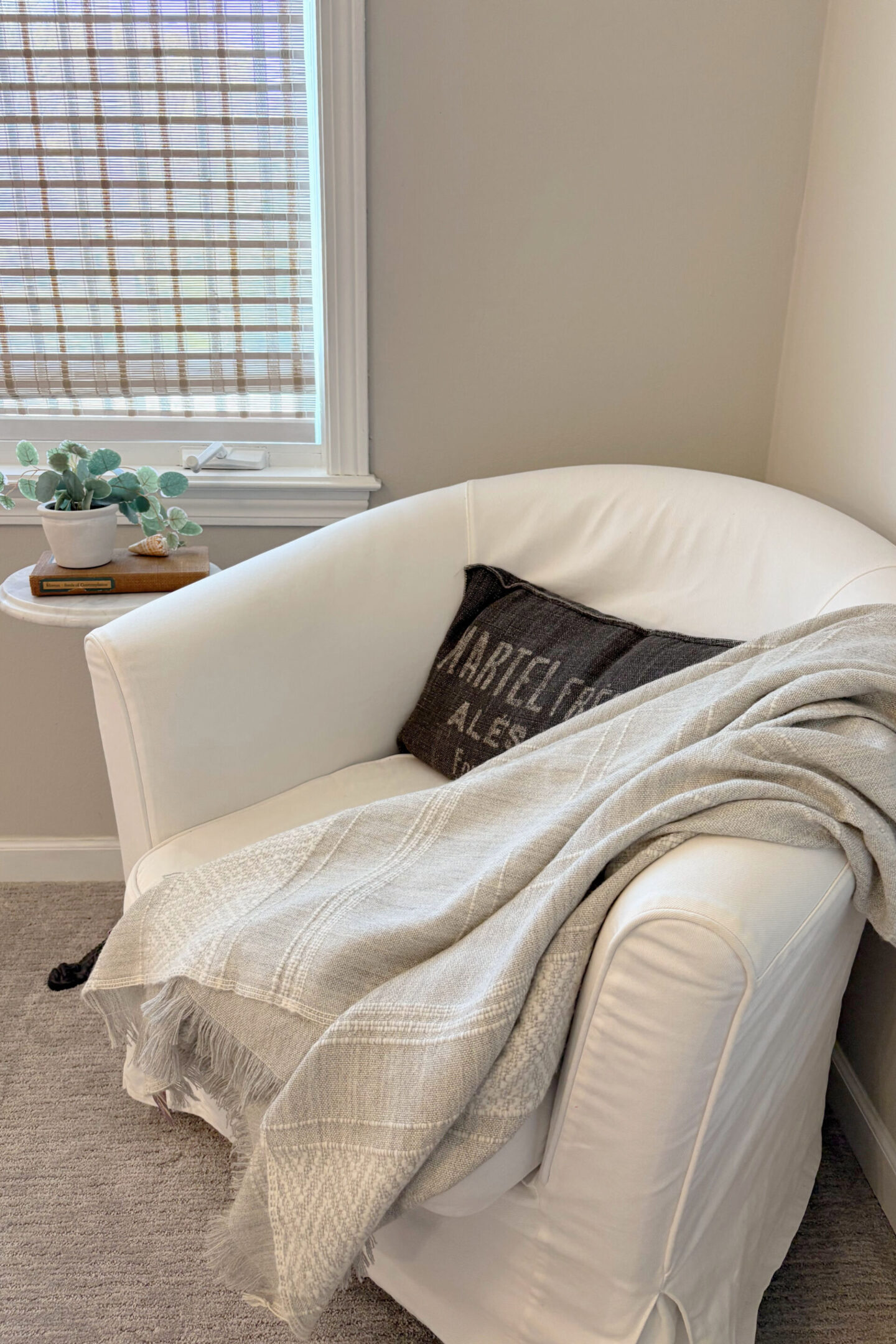 Hello Lovely's superfine alpaca handwoven throw in light grey and white by Purple Nest Design is a timeless natural collectible treasure.