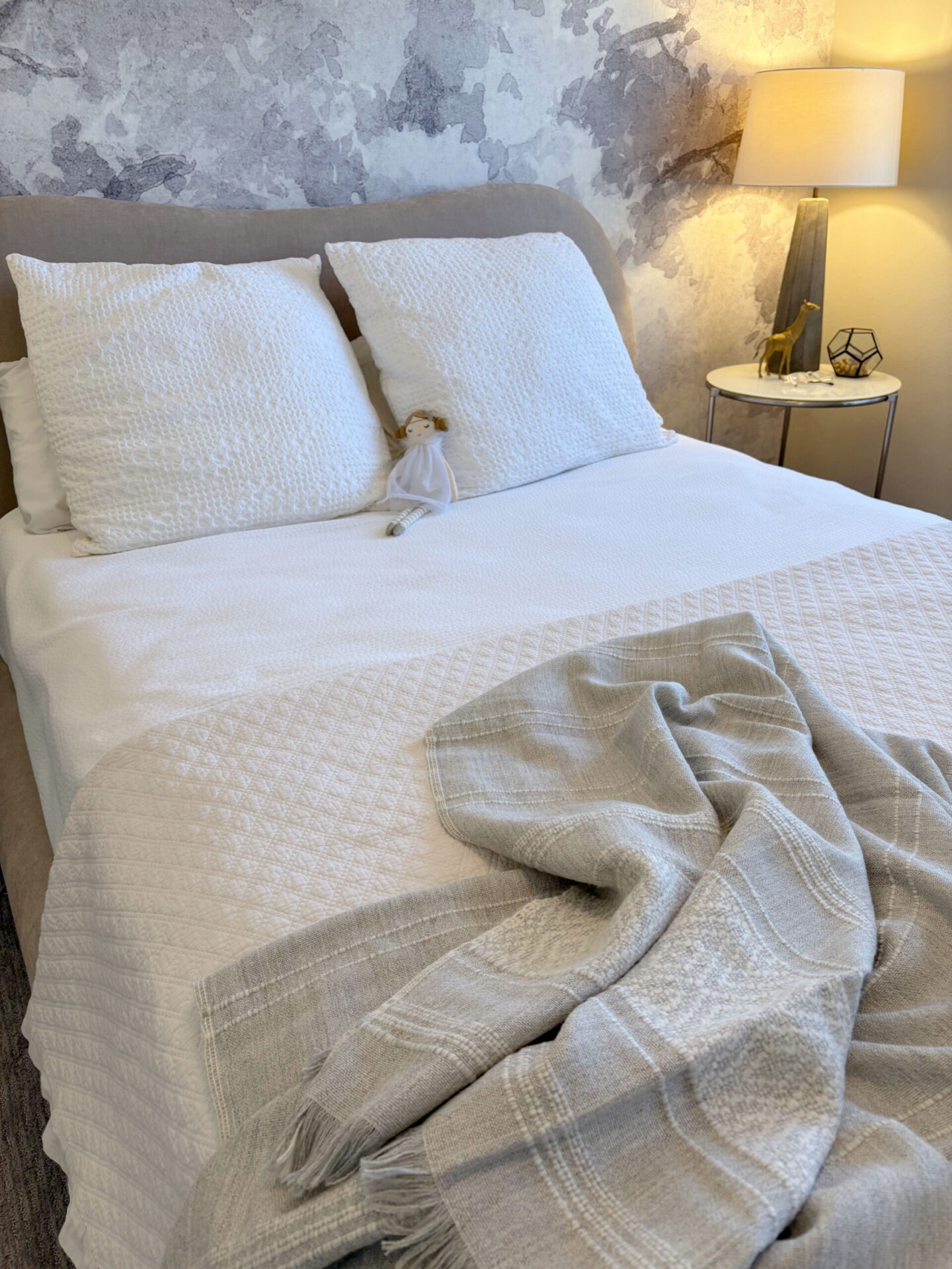 Hello Lovely's superfine alpaca handwoven throw in light grey and white by Purple Nest Design is a timeless natural collectible treasure.