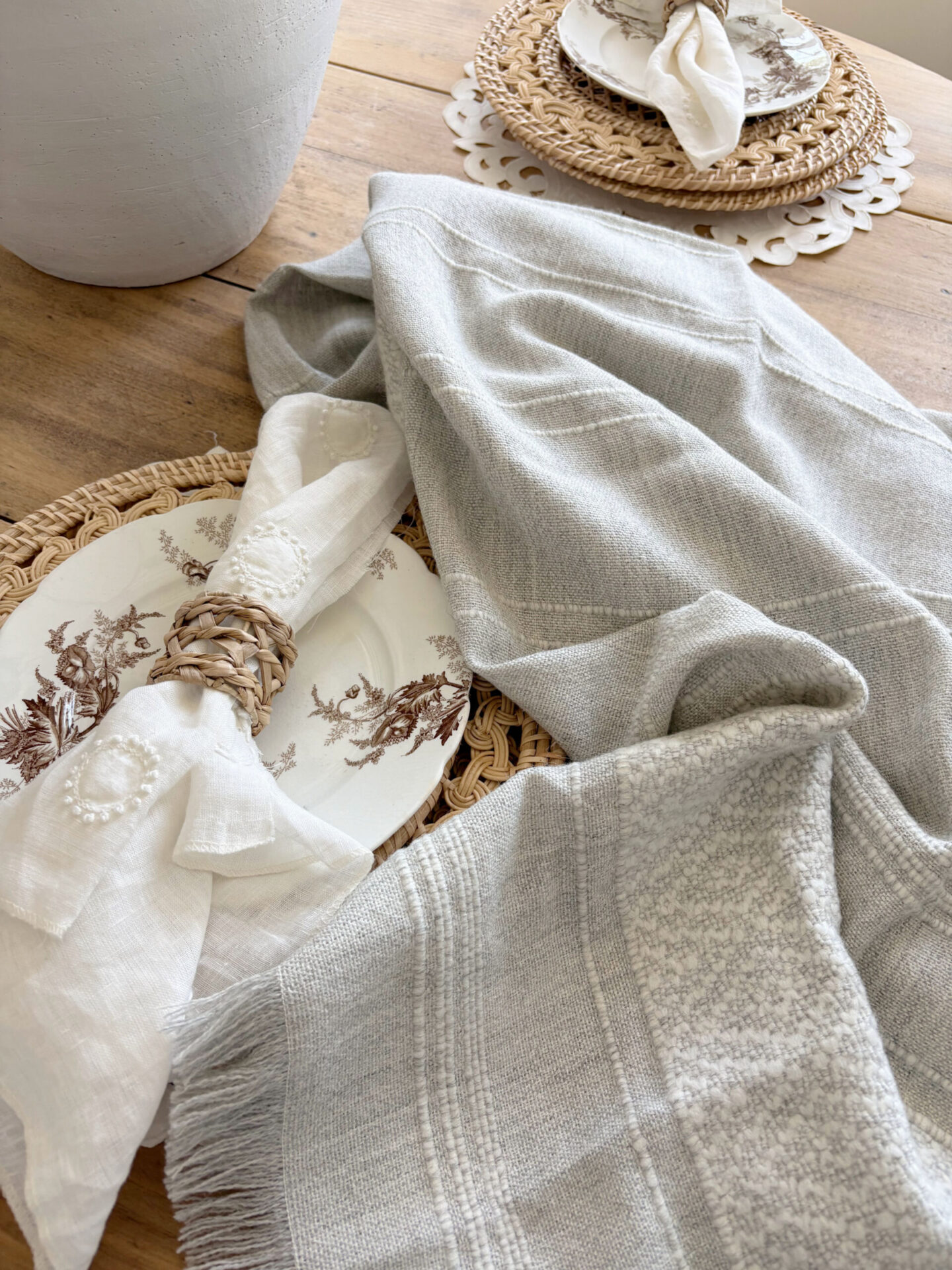 Hello Lovely's superfine alpaca handwoven throw in light grey and white by Purple Nest Design is a timeless natural collectible treasure.