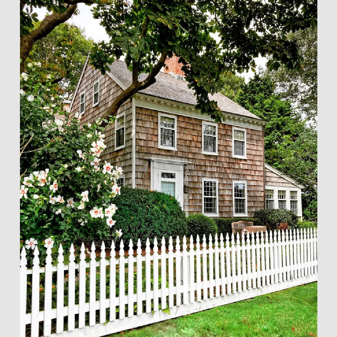 Cedar shake charming cottage with white picket fence in Country Living; photo by Susan Kaufman.