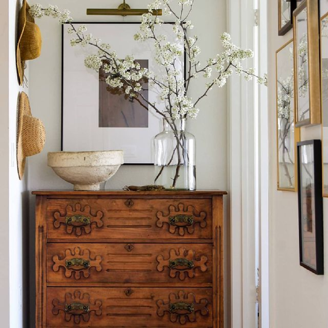 Wildflower Home designed coastal cottage bedroom with vintage dresser. #moderncountry
