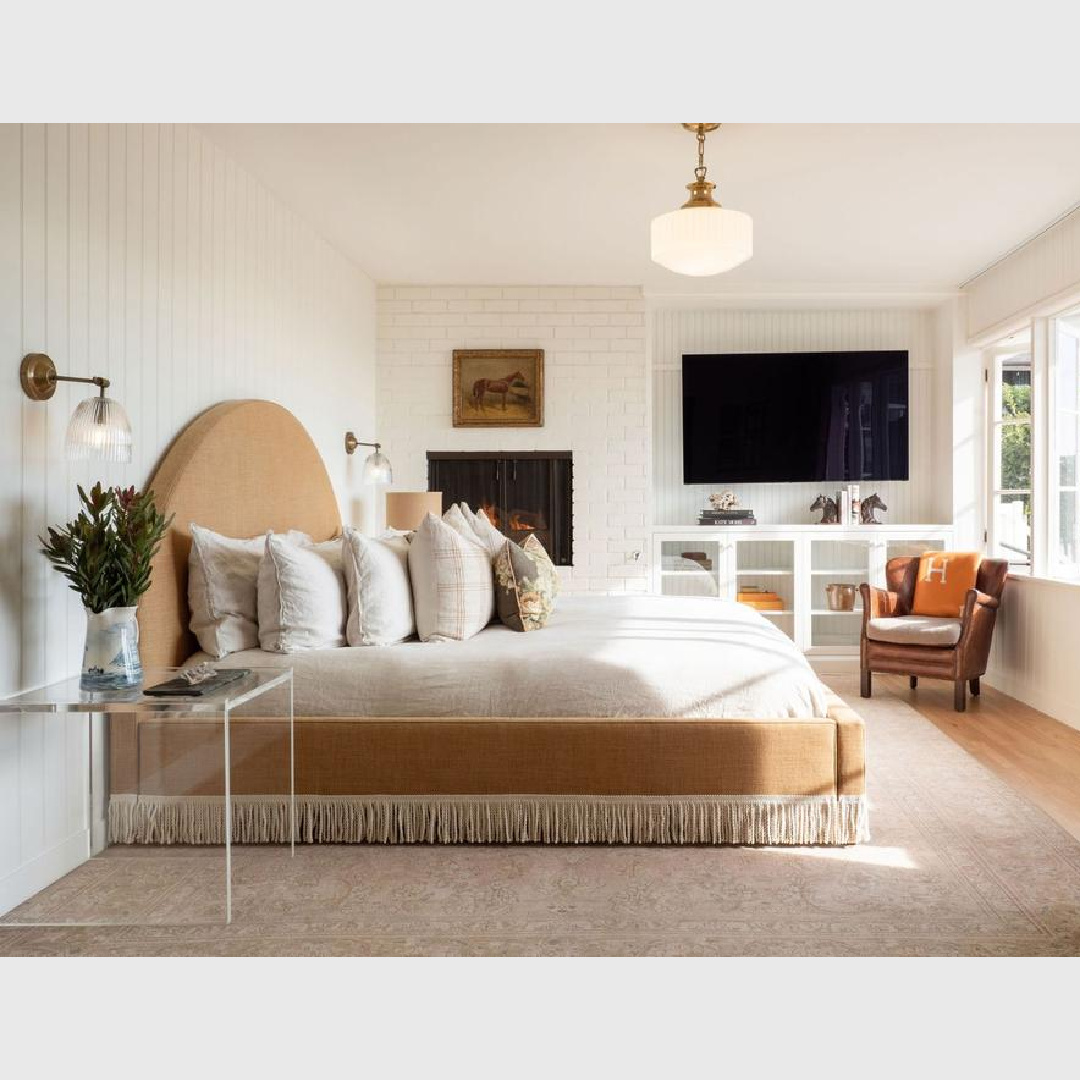 Farrow & Ball All White bedroom with painted brick fireplace and tongue and groove paneling. Avi Brosh and Kirsten Leigh Pratt. Vogue Living Australia - photo: Caylon Hackwith.