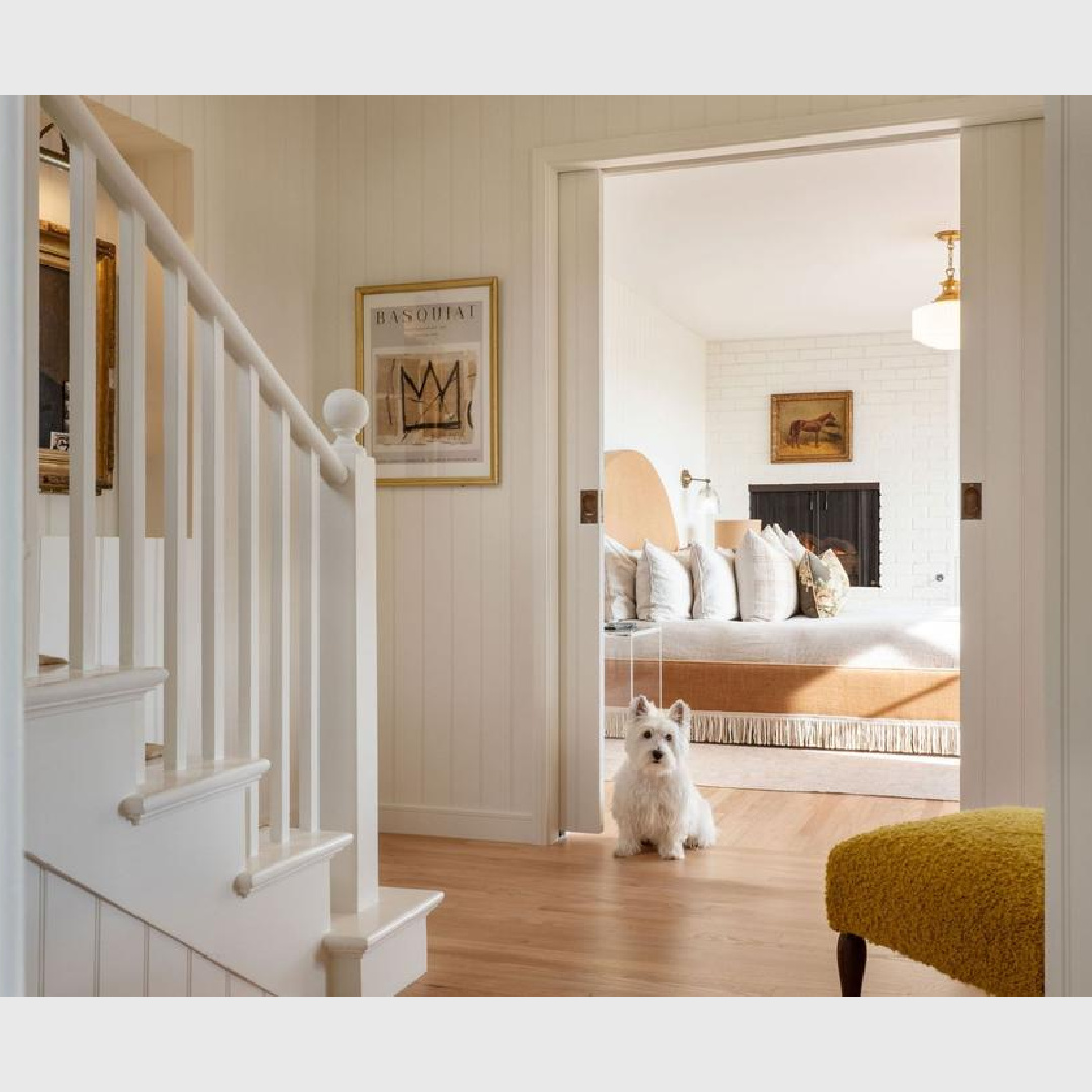 Westie in hall of a Malibu 1941 cottage with English Country interiors - Avi Brosh and Kirsten Leigh Pratt. #farrowandballallwhite