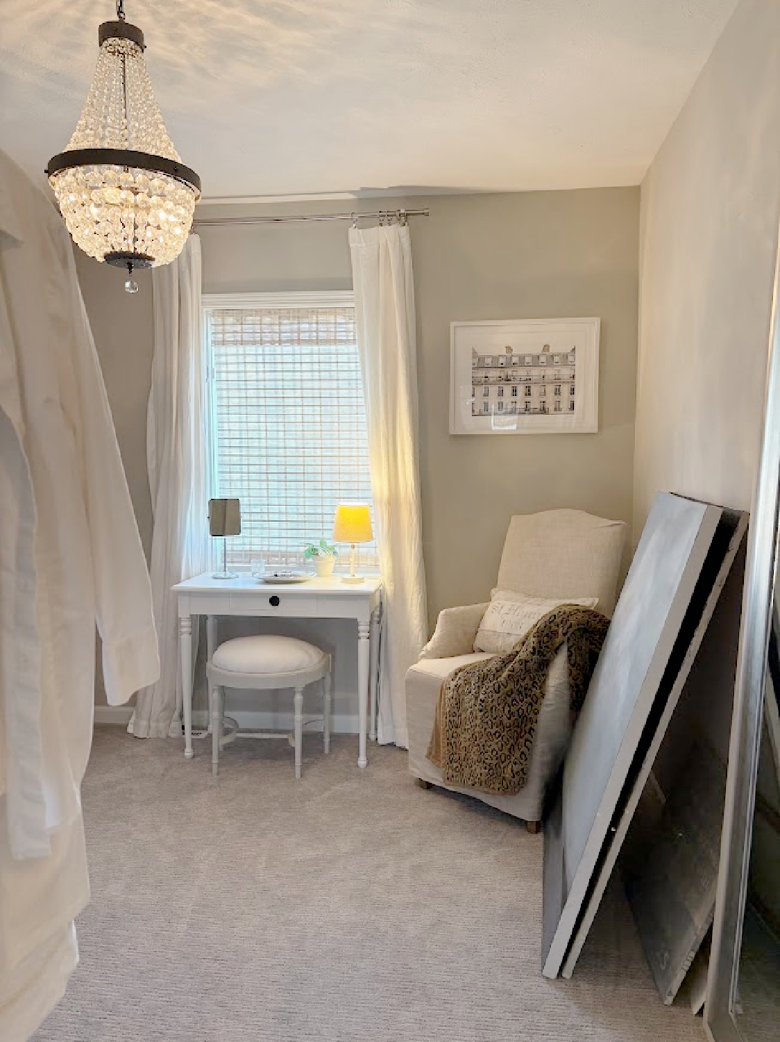 Sherwin Williams Agreeable Gray in my dressing room with vanity area and slipcovered Belgian linen chair - Hello Lovely Studio.