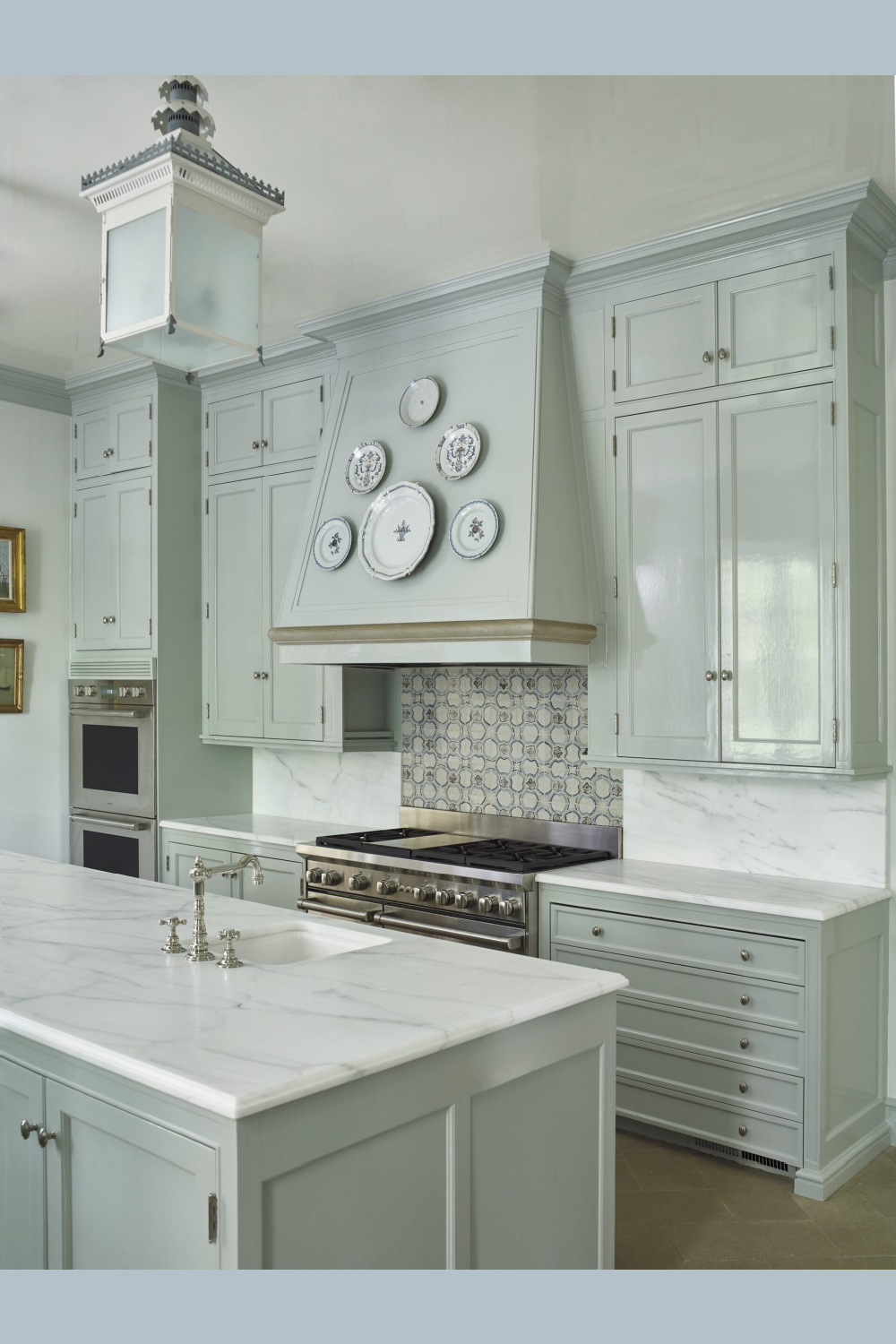 Light blue kitchen in Cathy Kincaid designed interior at a Highland Park Beaux Arts home.