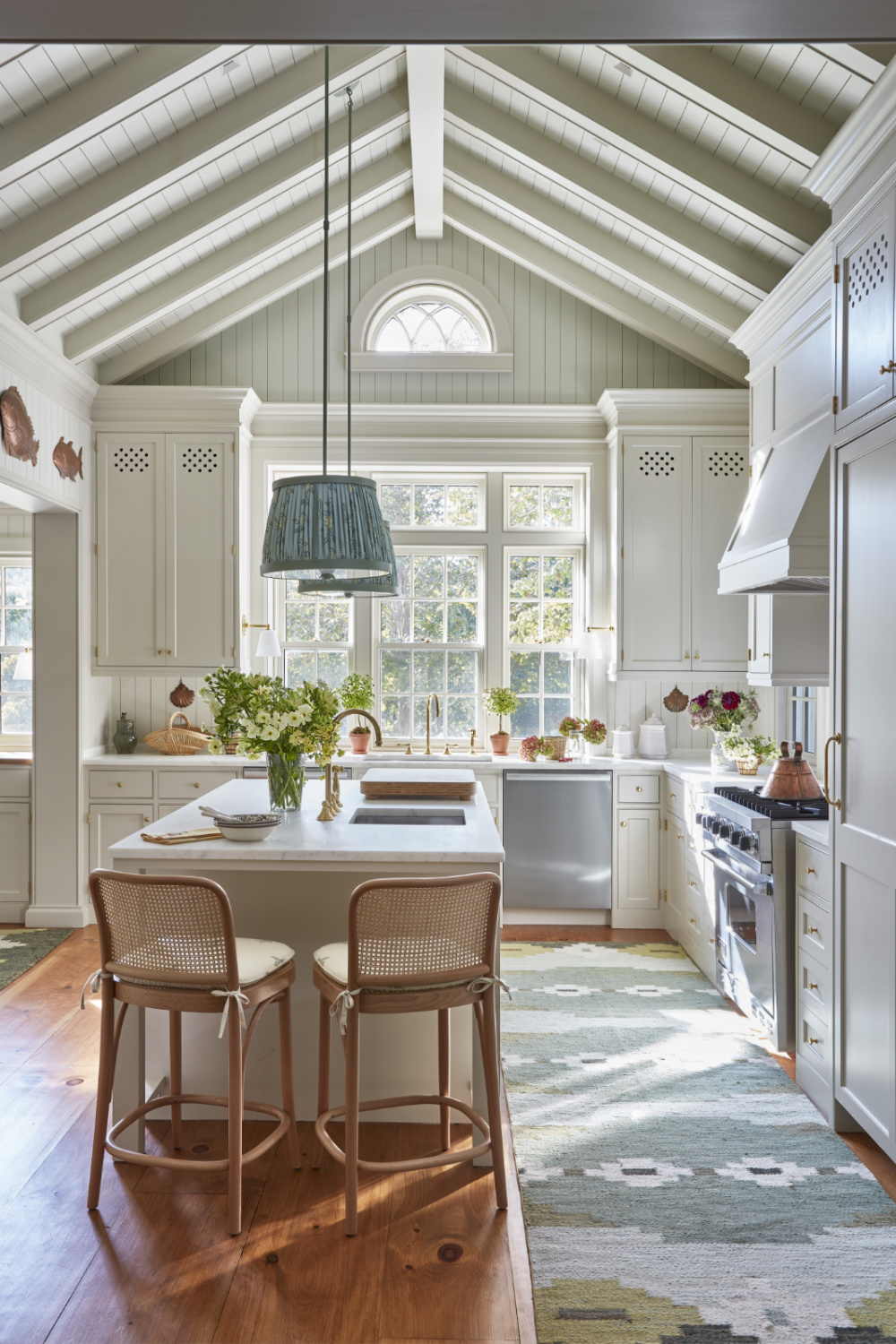 Charming kitchen with exposed beams in Cathy Kincaid designed whaler's cottage.