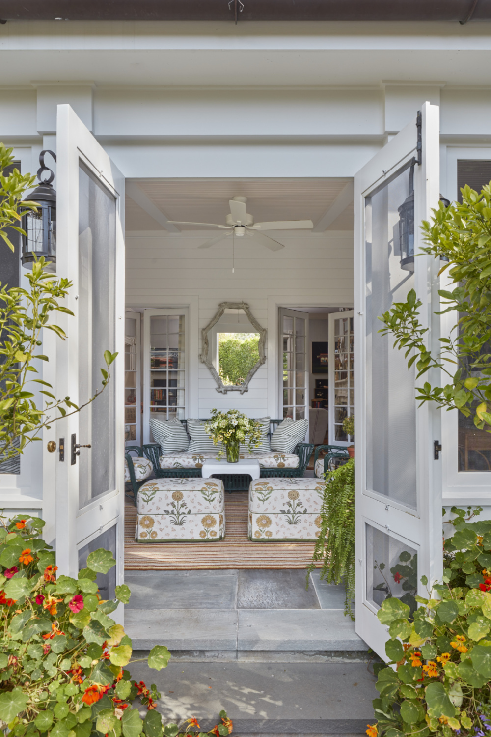 Screen porch in Cathy Kincaid designed whaler's cottage.