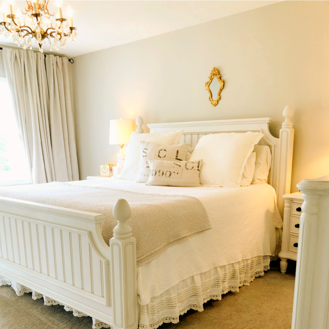Hello Lovely's country French bedroom - walls are SW Agreeable Gray, and Honeydew sheets and pillows are favorites on the cottage style bed.