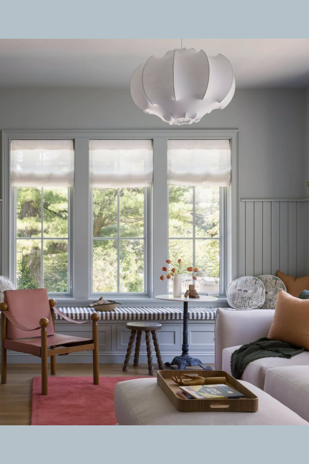 Farrow & Ball Light Blue paint color in a den with window seat.