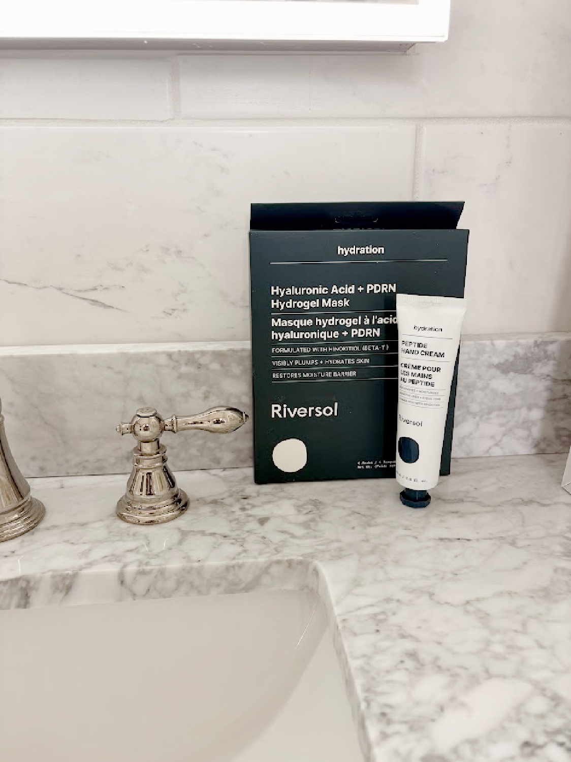 Riversol Skincare hand cream and masks on Hello Lovely's vanity.