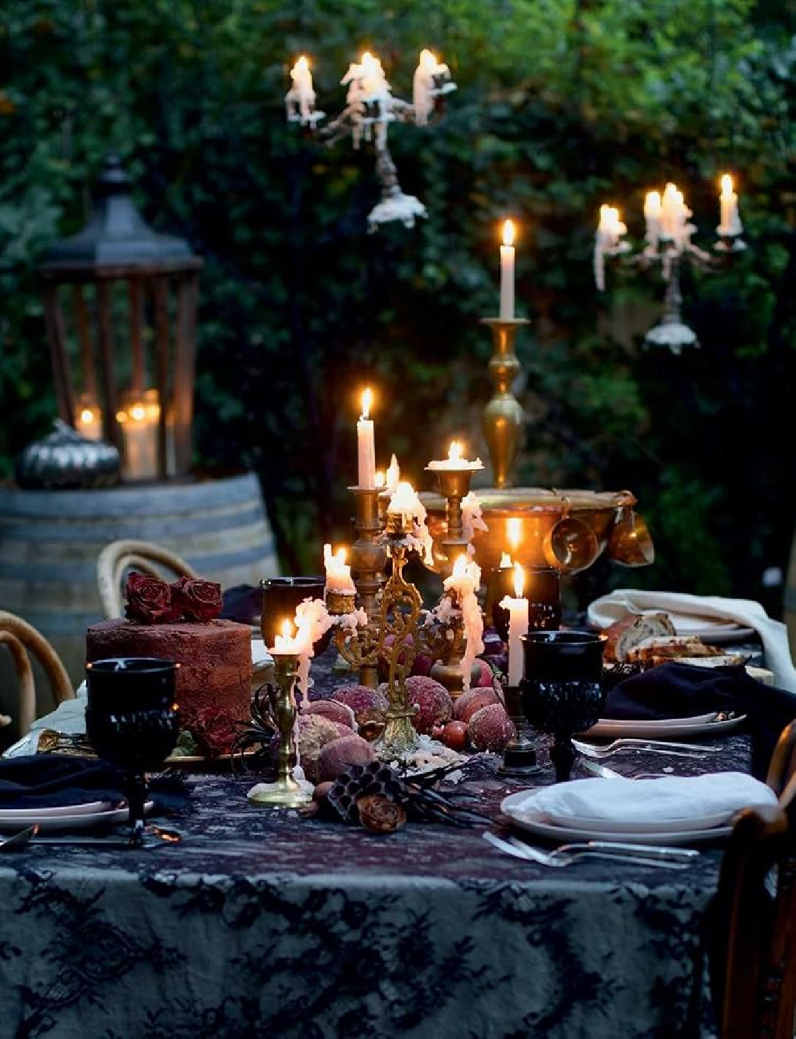 Enchanting outdoor candlelit tablescape by Courtney Allison in her book FRENCH COUNTRY COTTAGE SEASONS (Gibbs Smith, 2026).