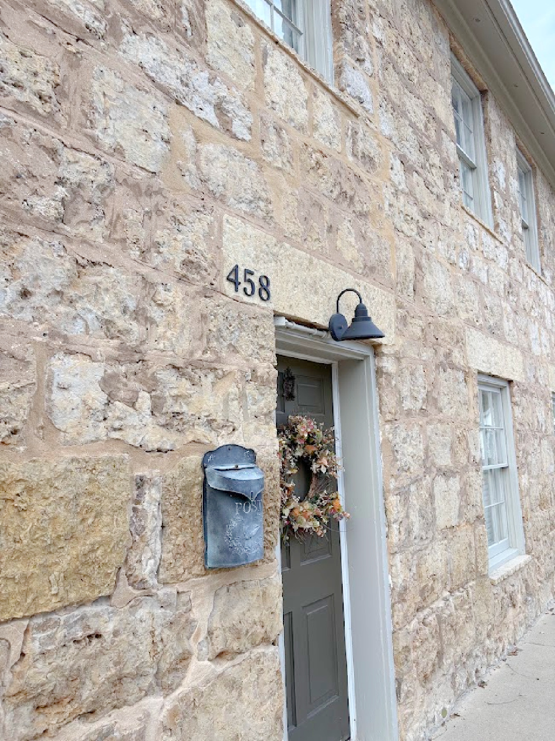 Historic Galena, IL limestone house built in 1827 - Daniel Harrison House (458 Dewey Ave) - photo by Hello Lovely Studio.