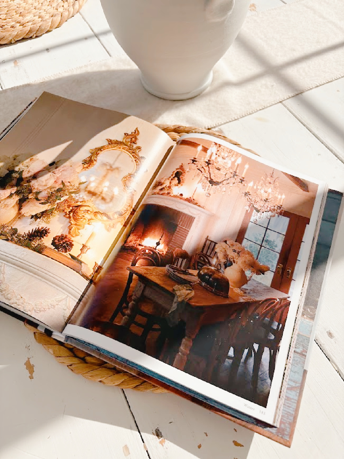 French Country Cottage Seasons book on Hello Lovely's kitchen table.