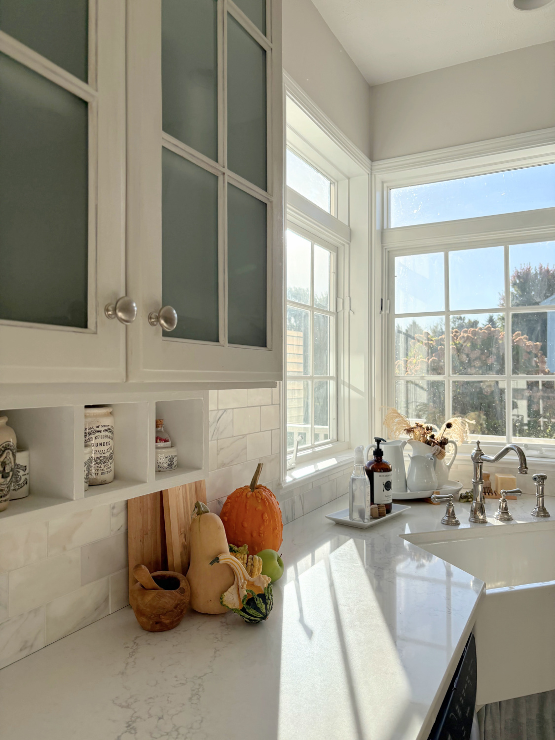 Hello Lovely's modern French kitchen in October - counters are Muse (VIATERA quartz), and backsplash is calacatta gold marble.