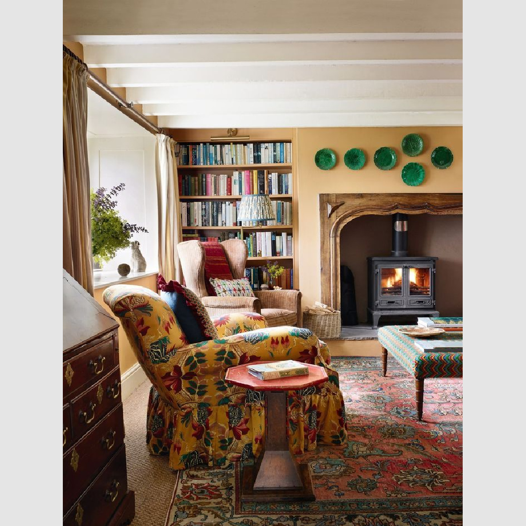 Lovely yellow den with fireplace and English country decor - House and Garden UK.